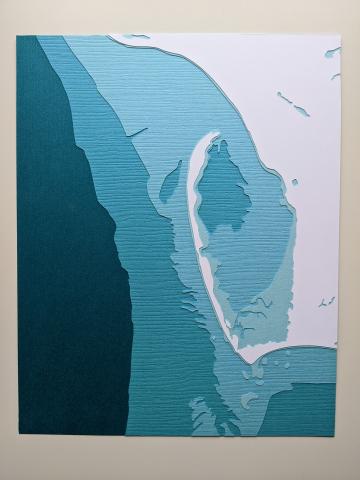 photo of cut paper art featuring Cape San Blas in Florida