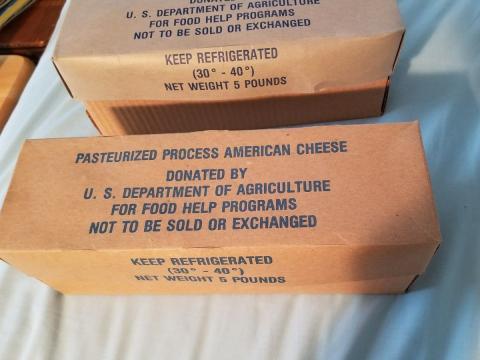 cardboard box of government cheese