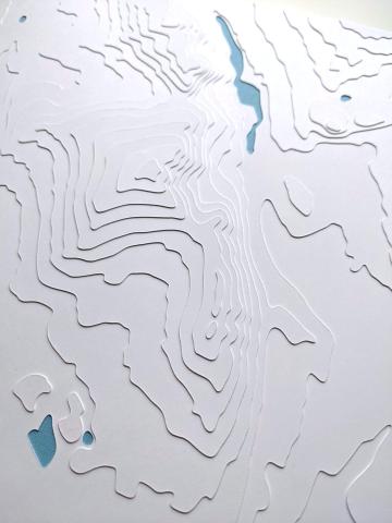 close-up photo of a Wind River Range cut paper artwork