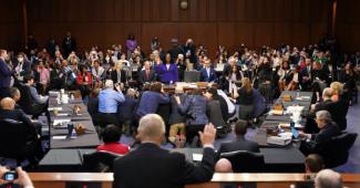 photo of Judge Ketanji Brown Jackson being sworn in at her confirmation hearing.